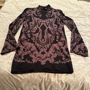 Very 70’s inspired mini dress by Free People